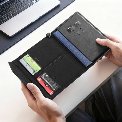 Black MagiPass crossbody travel card wallet with open compartments holding multiple cards, blue RFID protection strip, and textured surface—designed for boarding and travel convenience.