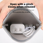 Gray anti-theft coin pouch with secure pinch closure holds 20W charger & cable - MarkRyden Global