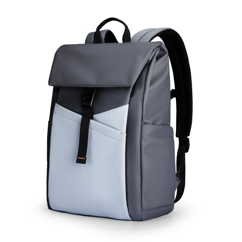 Elegant gray backpack with light gray front pocket, black buckle strap, padded shoulder straps, and spacious compartments for modern travelers.