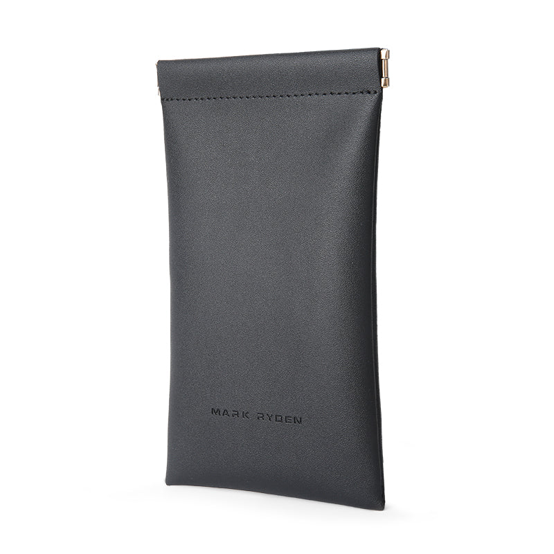Dark gray Mark Ryden sunglasses pouch with smooth leather-like material, roll-top closure with gold accent, designed to carry eyeglasses or data cables.