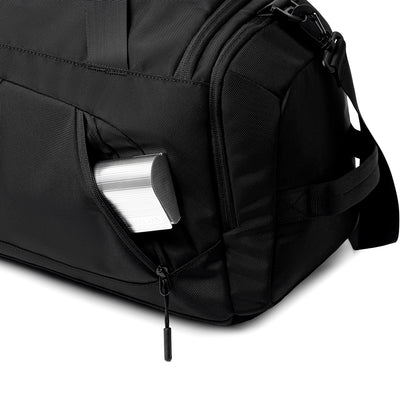 Black Worksman II gym duffel with wide-open pocket holding silver accessory - MARK RYDEN Global