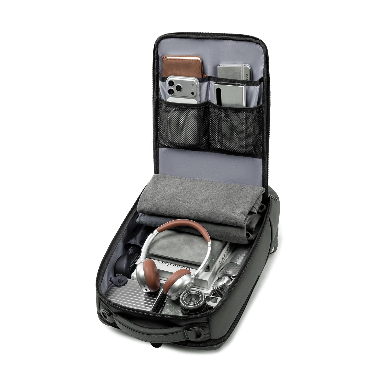 MarkRyden Compacto Pro futuristic daily backpack open with tech, accessories, headphones
