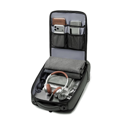 MarkRyden Compacto Pro futuristic daily backpack open with tech, accessories, headphones