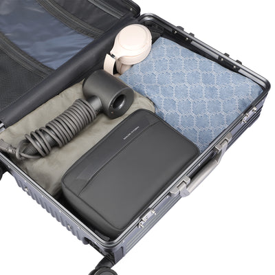Mark Ryden compact multi-layer washbag in travel suitcase with accessories