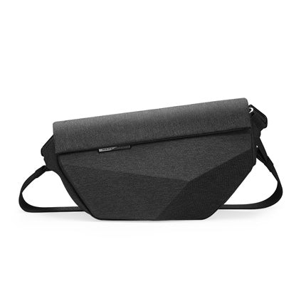 Dark gray Diamond Facets hard case crossbody bag with geometric faceted design, roll-top closure, and adjustable strap—large capacity, waterproof, scratch-resistant for modern travelers.