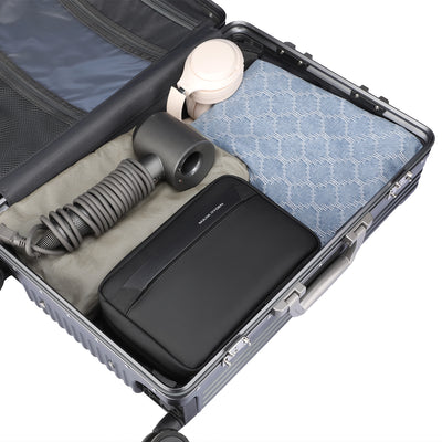 Mark Ryden compact washbag with accessories in travel suitcase